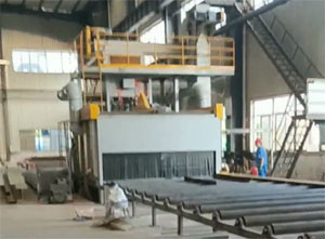 济南钢板预处理生产线安装现场，包括抛丸机、喷漆室、烘干室等